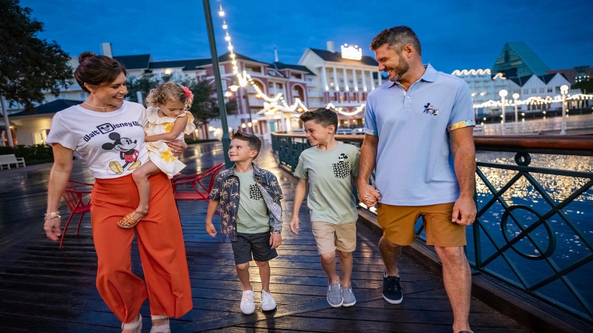happy family walking at Disney BoardWalk